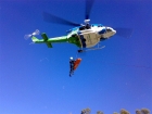 080729110916_Intensive_Care_Flight_Paramedic-Mt_Taylor_winch_2-ACT_Ambulance-Snowy_Hydro_SouthCare_Helicopter-www.ambulancevisibility.com-Kelly_Green